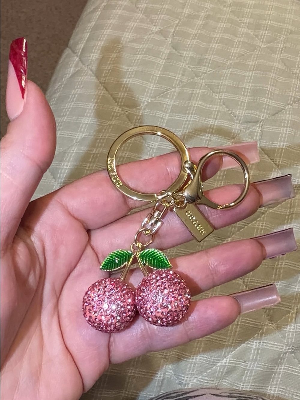 Coach Pink Crystal Cherry Keyring with Gold Hardware